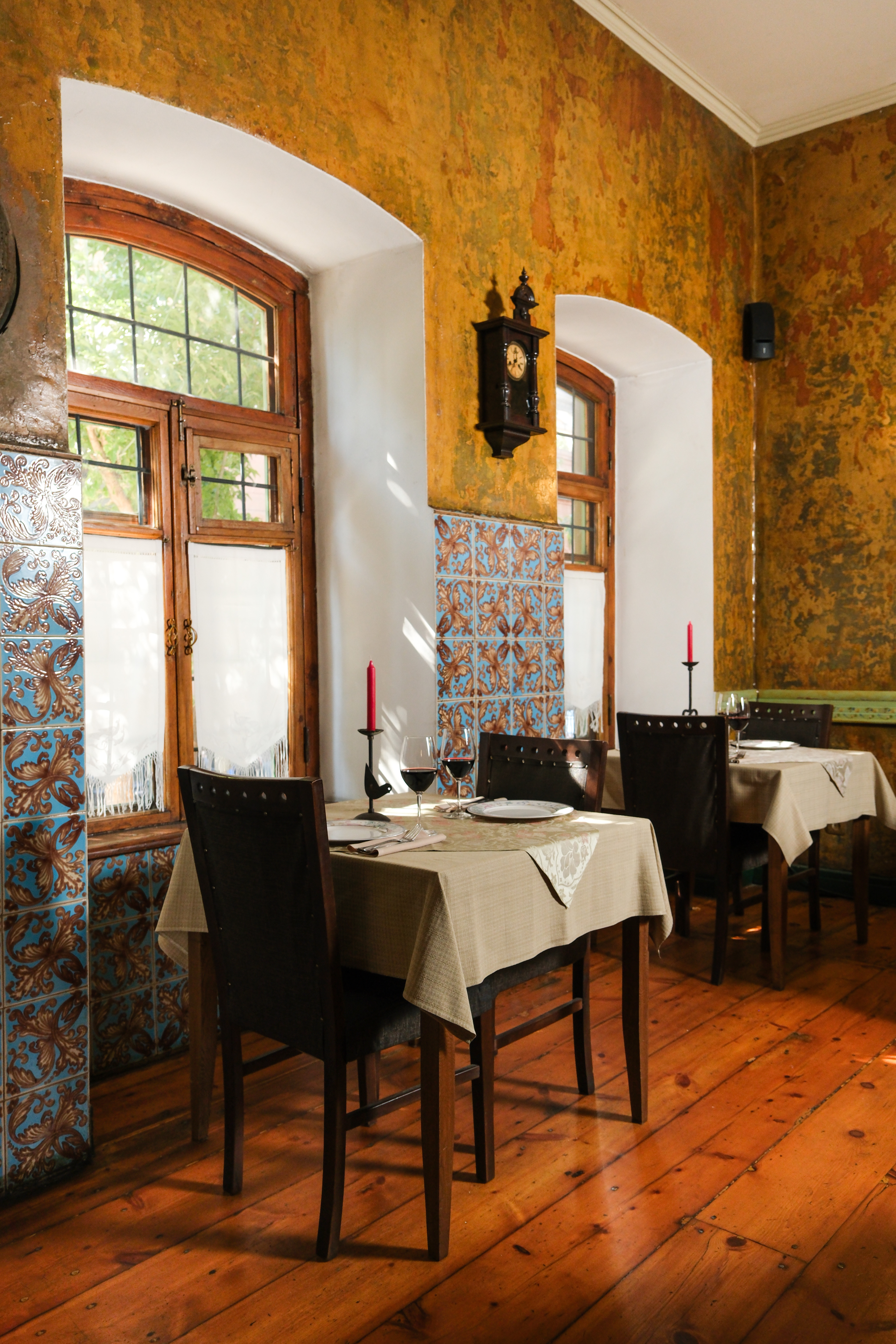 Dolmama dining room with heritage tiles and set tables